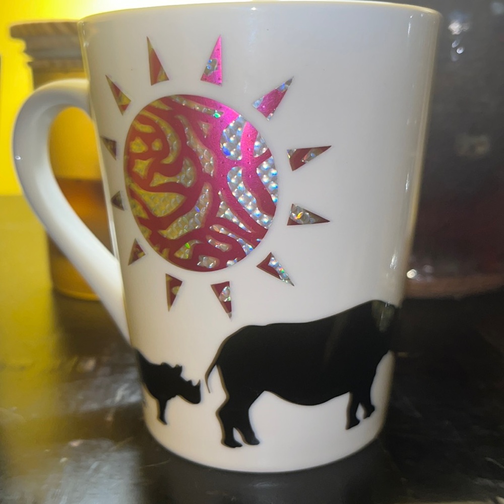 Royal Norfolk Safari Rhino and tree mug coffee cup with a pink and silver sun.